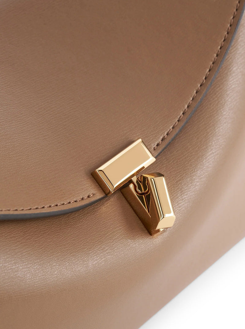 T-LOCK LEATHER CLUTCH
