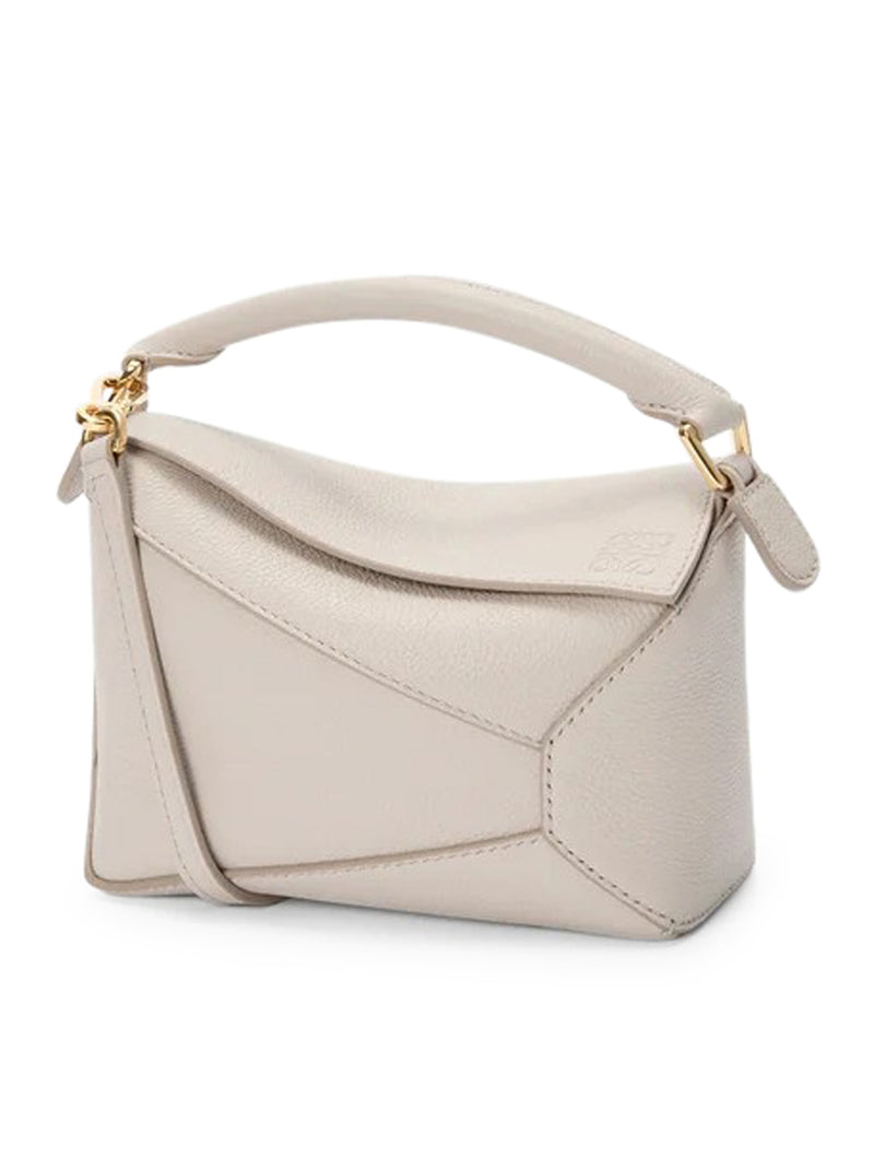 PUZZLE EDGE MINI BAG IN GRENADE LEATHER