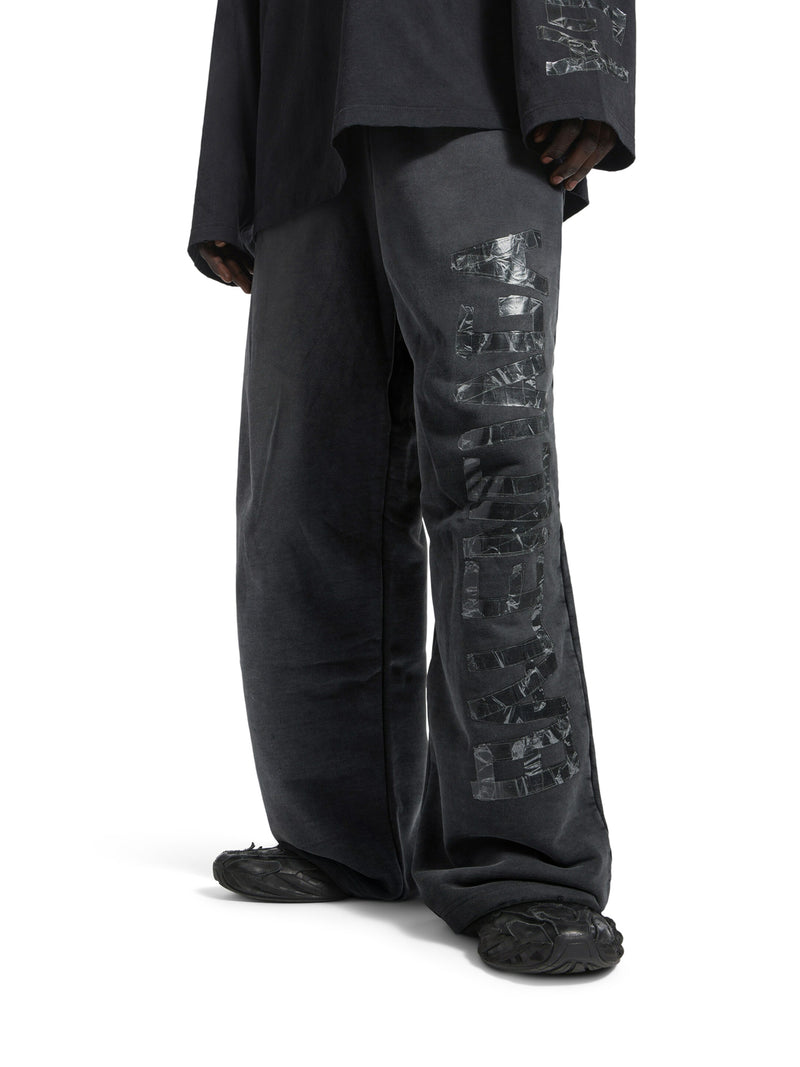 WIDE TROUSERS WITH TRANSPARENT TAPE
