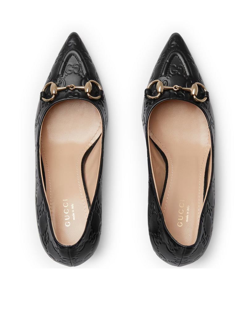 DÉCOLLETÉ WITH HORSE CLIP