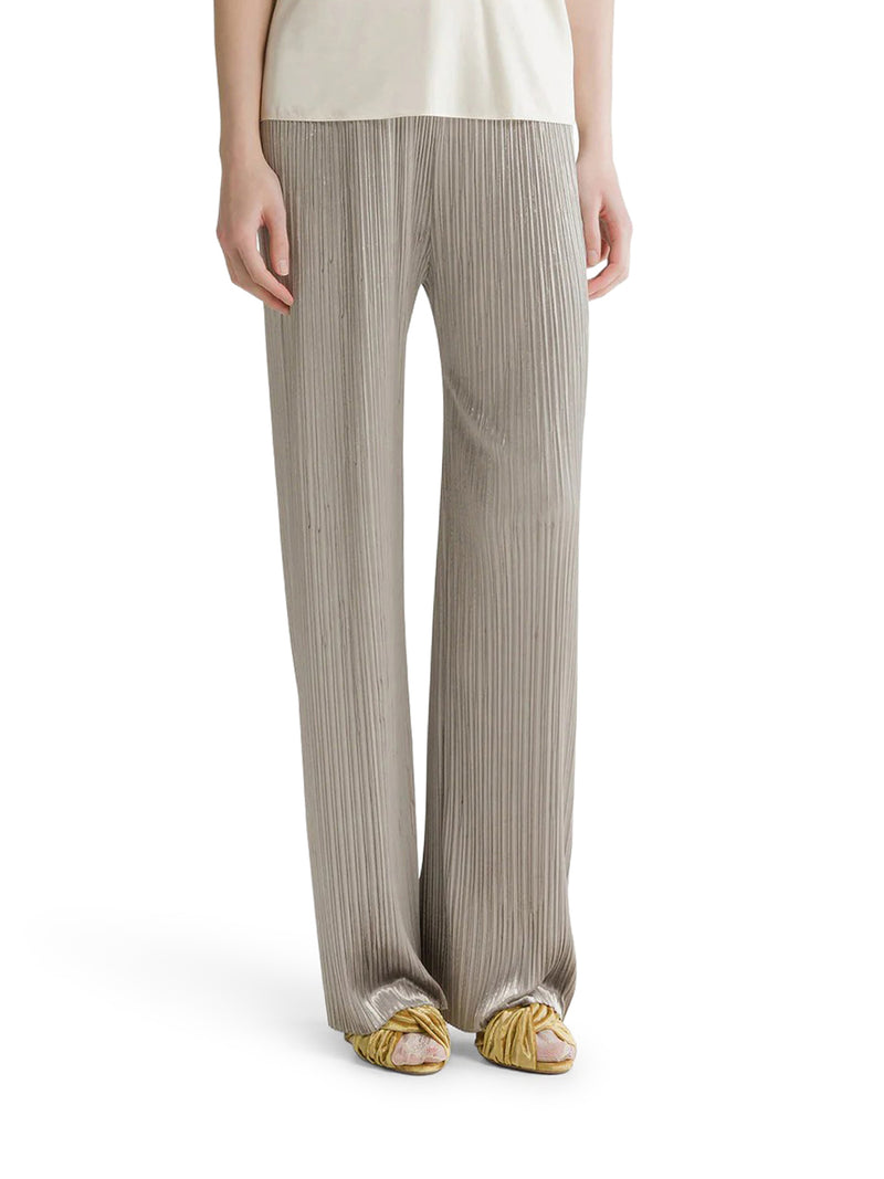 TROUSERS WITH AN ELASTICATED WAIST AND IRREGULAR PLEATING