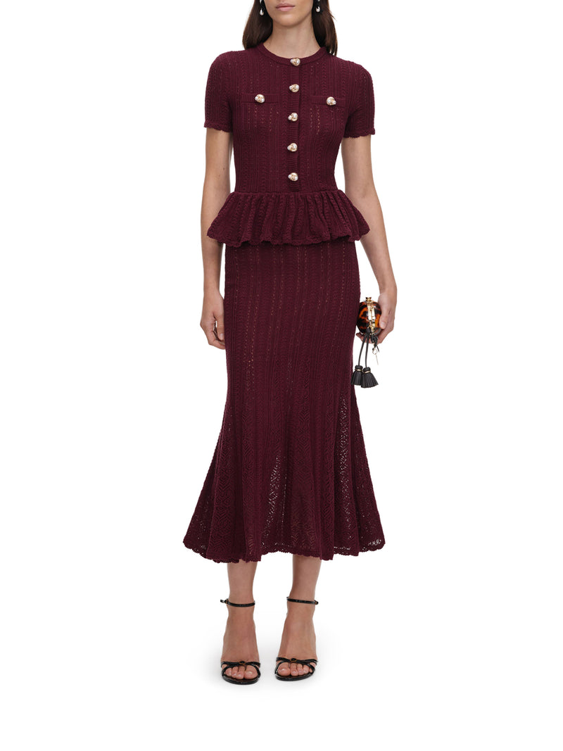 LONG DRESS IN OPENWORK KNIT WITH PEPLUM AND JEWEL BUTTONS