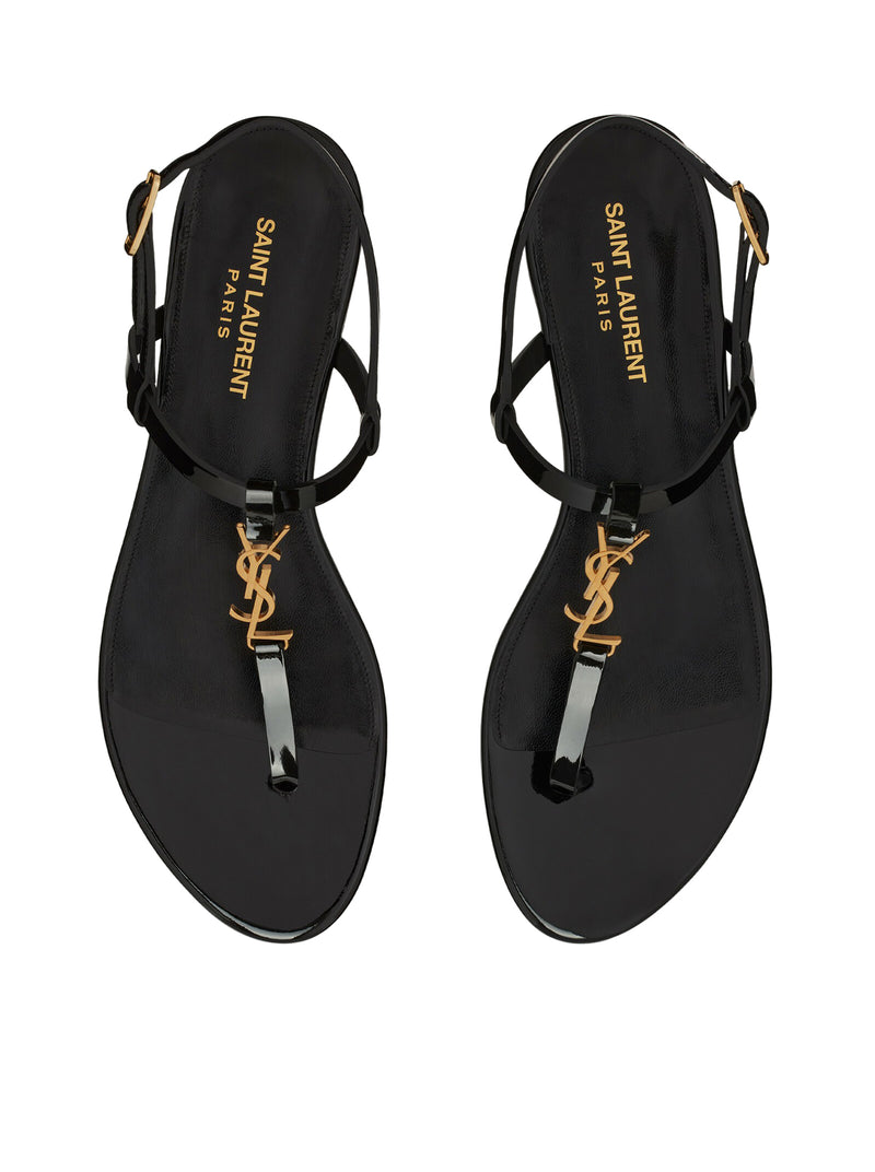 CASSANDRA FLAT SANDALS IN PATENT LEATHER WITH GOLD MONOGRAM