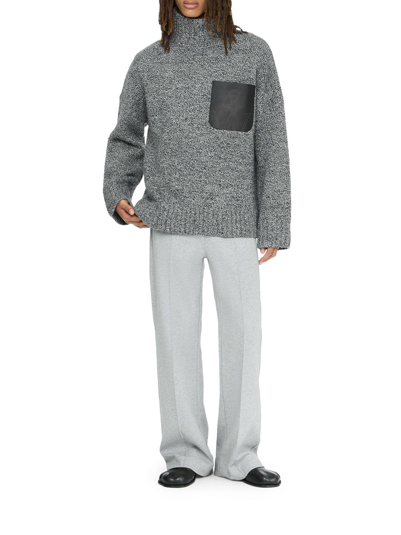 SWEATER WITH LEATHER POCKET