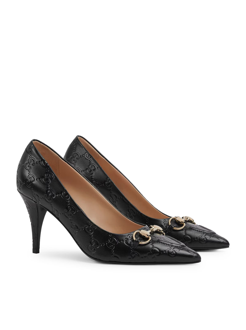 DÉCOLLETÉ WITH HORSE CLIP