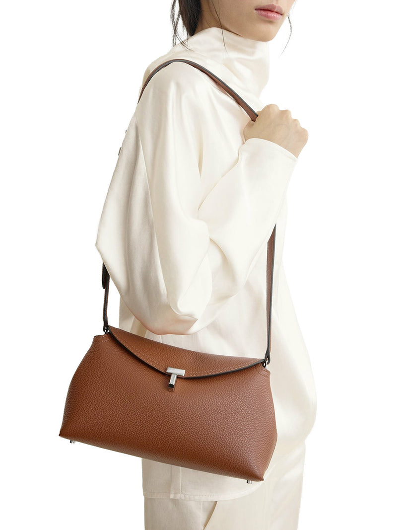 T-LOCK HAMMERED LEATHER CLUTCH