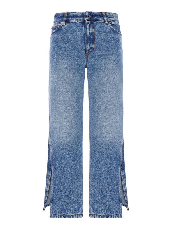 DENIM TROUSERS WITH FLARED LEG AND SIDE SLITS