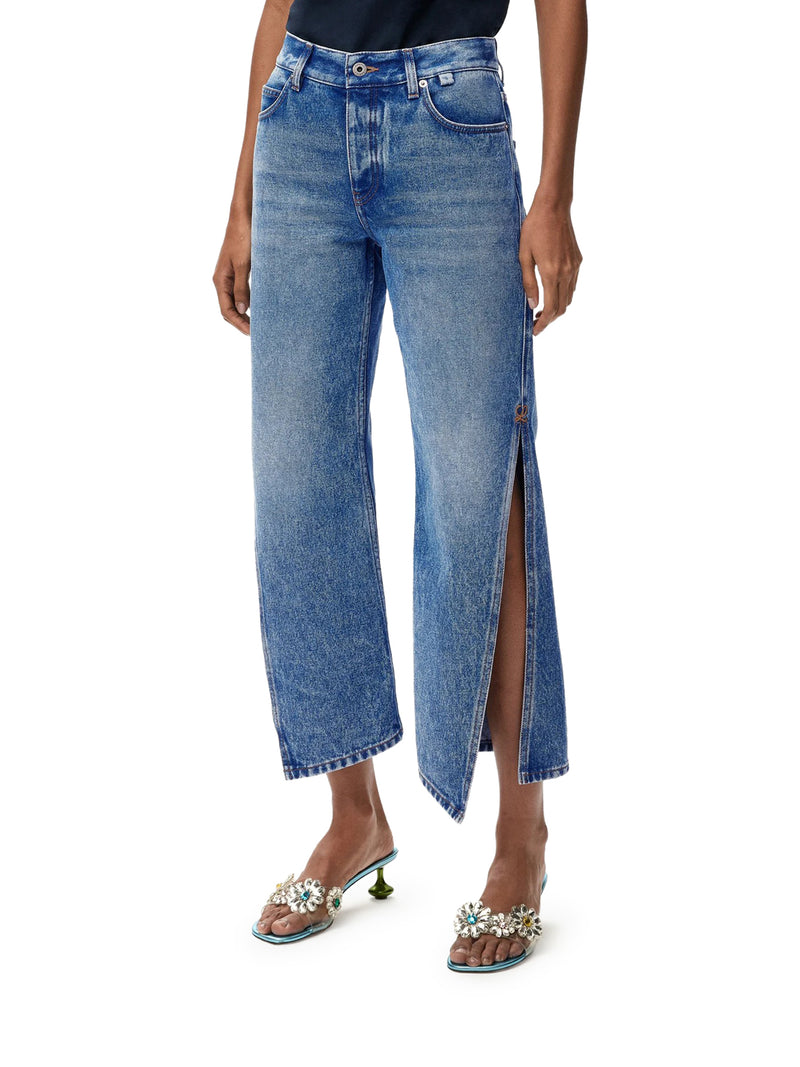 DENIM TROUSERS WITH FLARED LEG AND SIDE SLITS