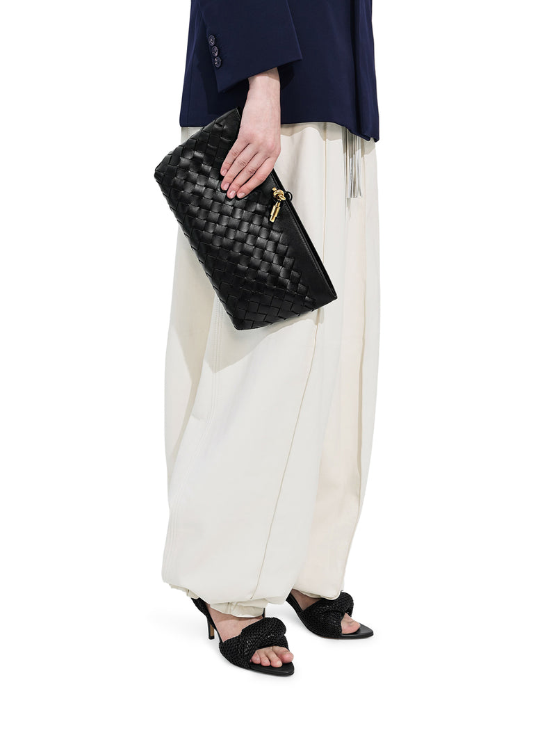 WOVEN NAPPA CLUTCH WITH DISTINCTIVE KNOT DETAIL