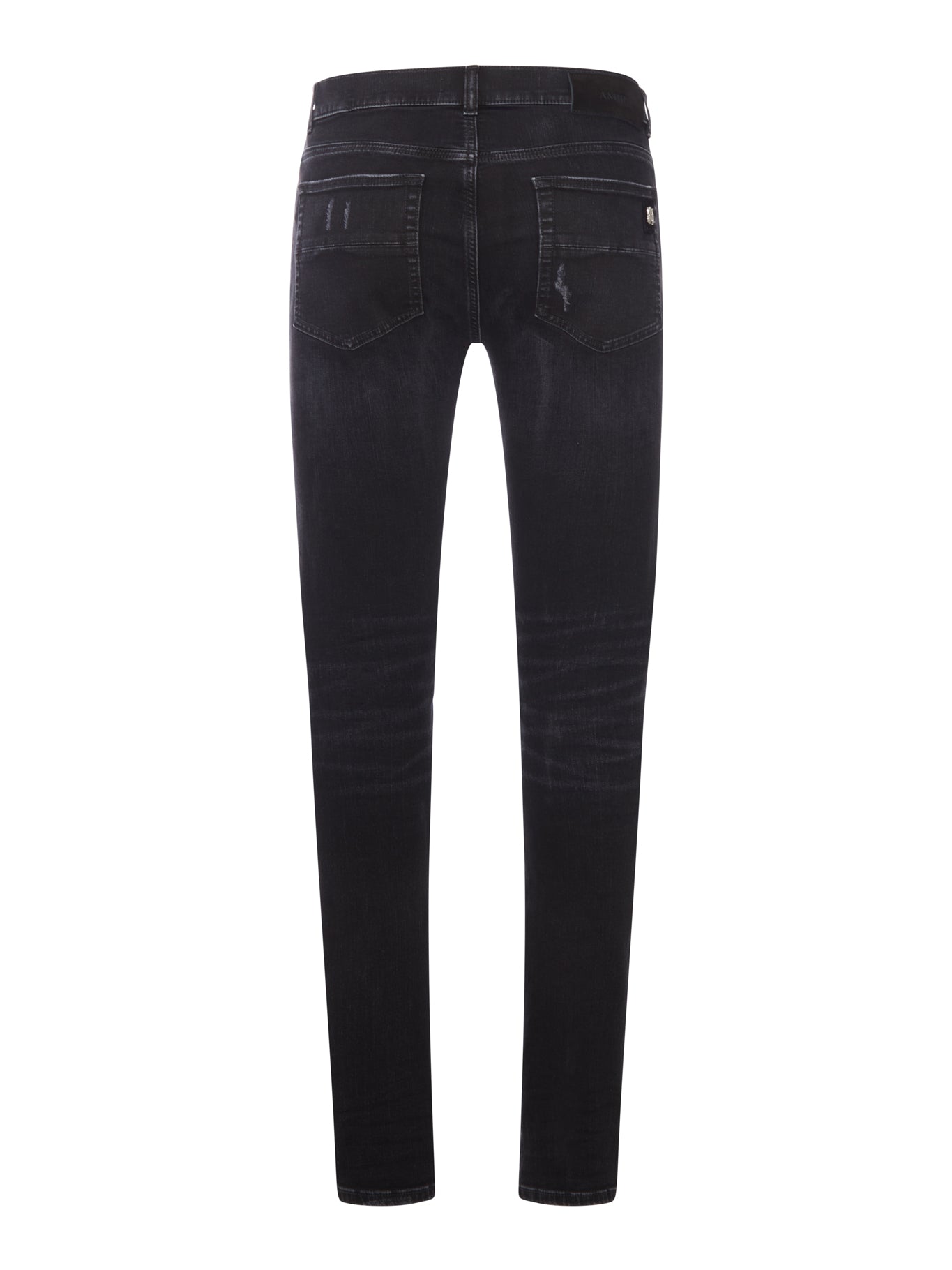 SKINNY JEANS WITH STUDS AND DESTROY DETAILS