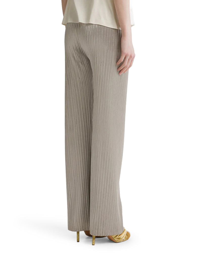 TROUSERS WITH AN ELASTICATED WAIST AND IRREGULAR PLEATING