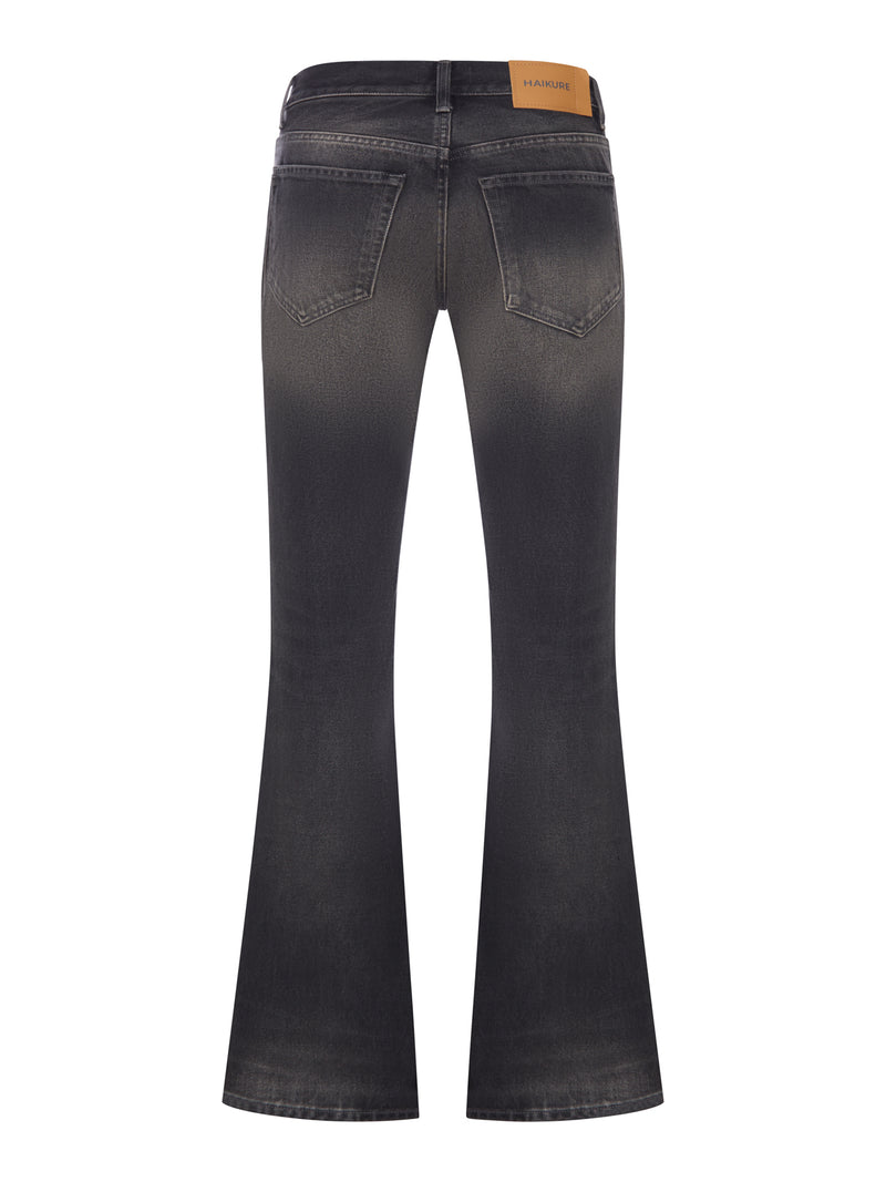 WASHED DENIM FLARE JEANS WITH POCKETS