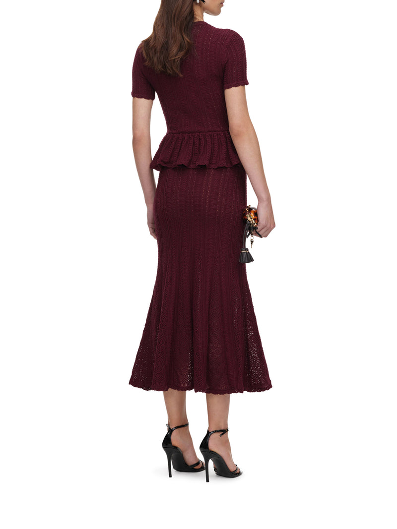LONG DRESS IN OPENWORK KNIT WITH PEPLUM AND JEWEL BUTTONS