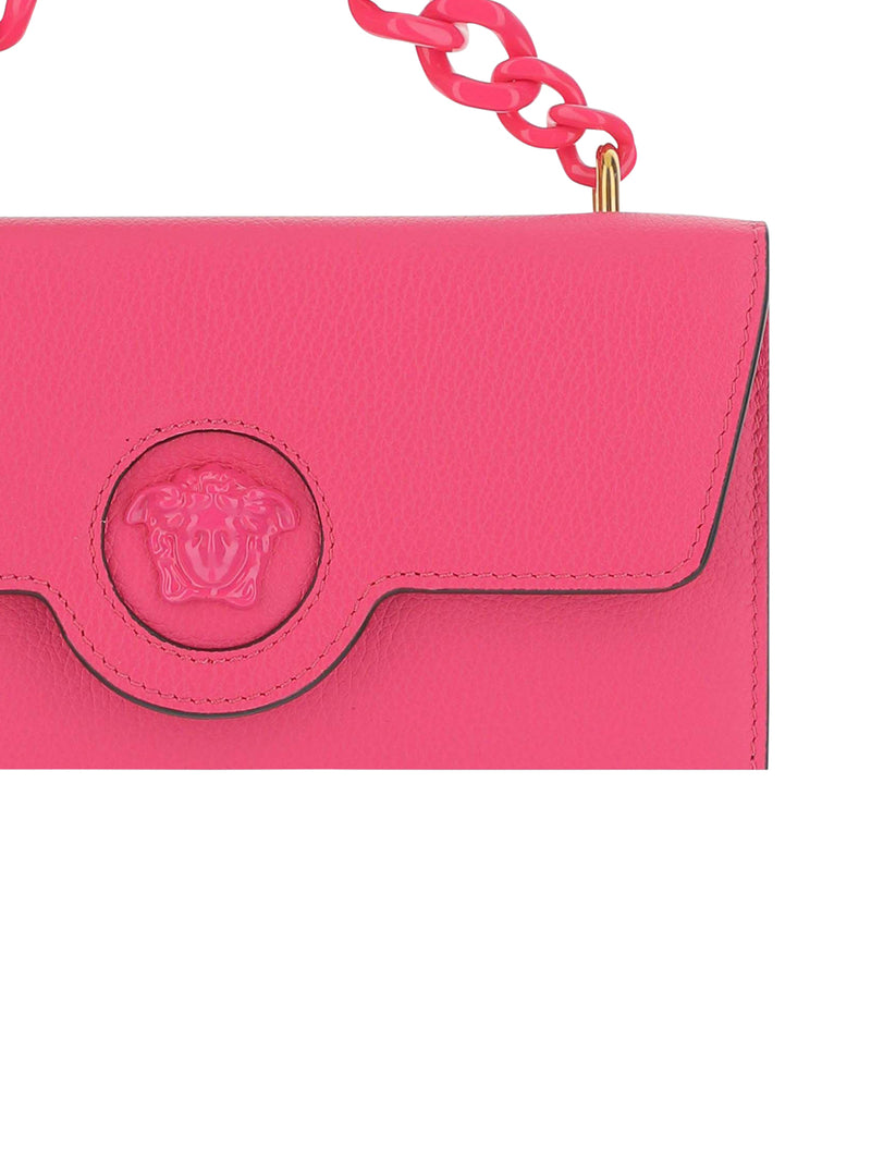 VERSACE: bag in hammered leather with Medusa - Pink