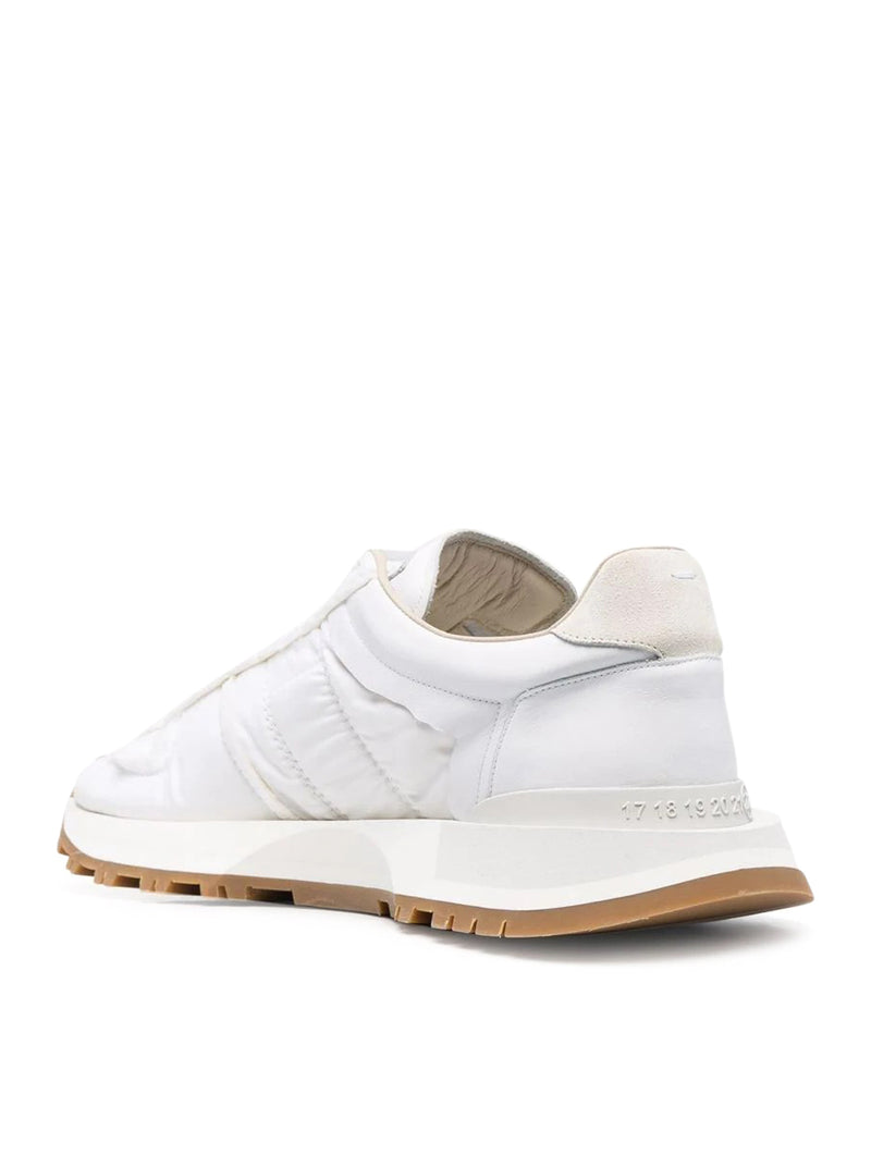 Sneakers with paneled design