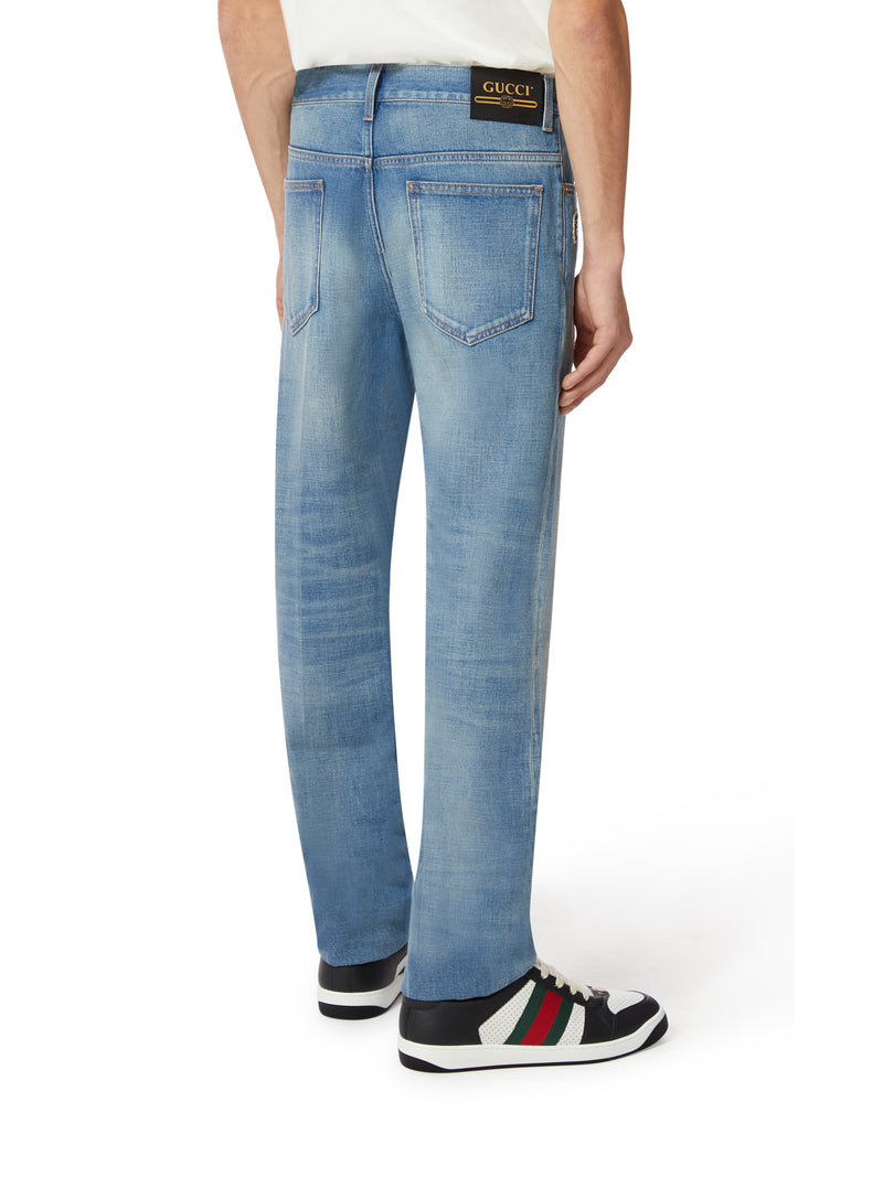 Denim pant with skunk patch