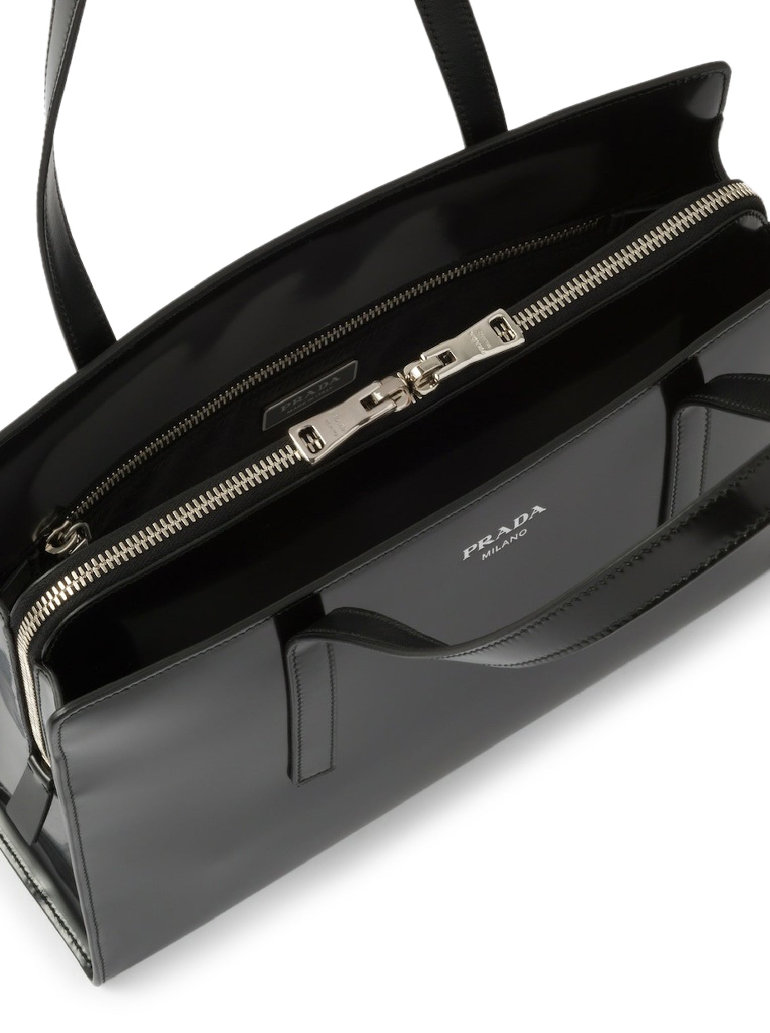 Prada Re-Edition 1995 mini bag in brushed leather – Suit Negozi Row