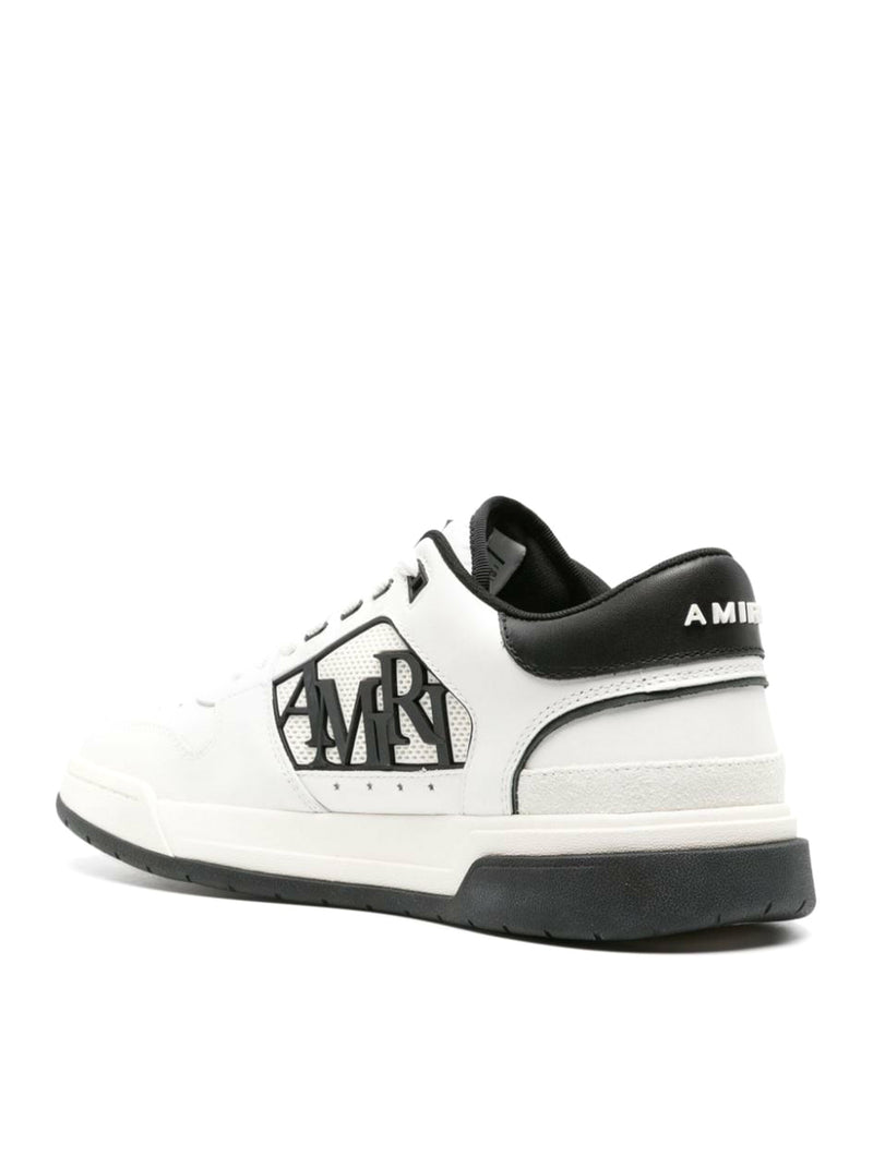 Sneakers with embossed logo